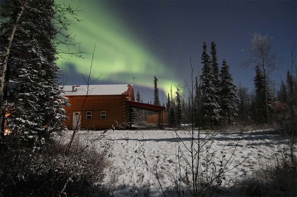 secluded cabin alaska northern lights