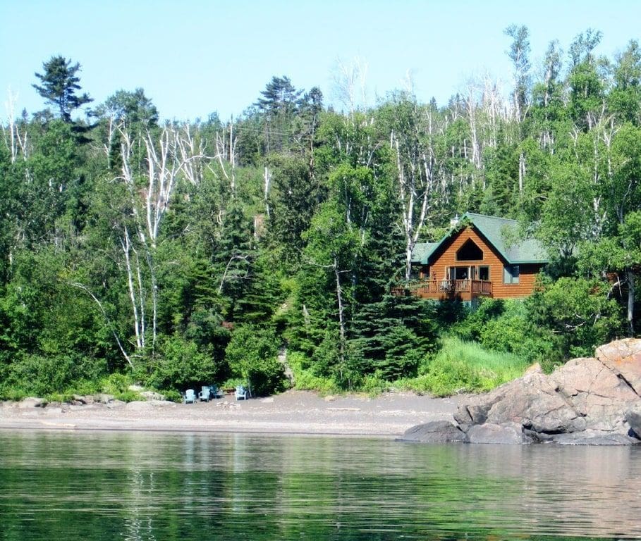 black beach secluded cabin