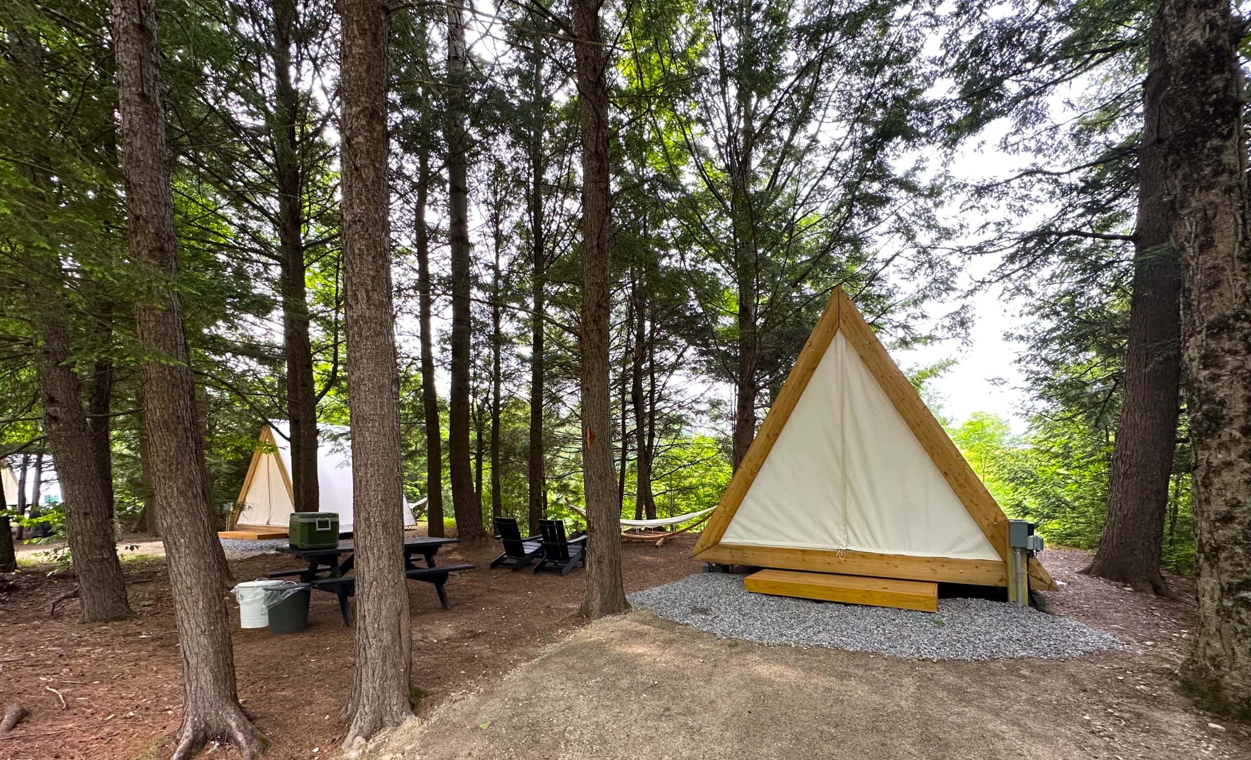 A-frame canvas tents at the Lumen Nature Retreat