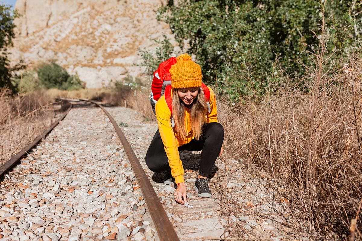 picking up trash hiking