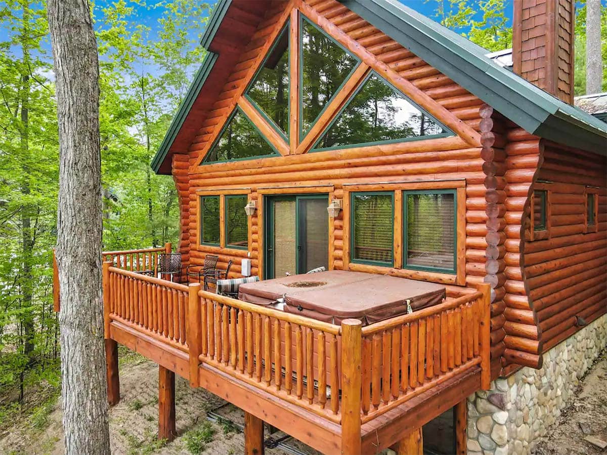 michigan cabin with hot tub on deck