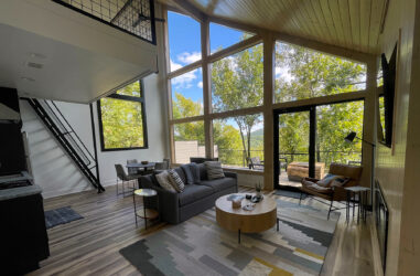 A large loving room inside one of the treehouses