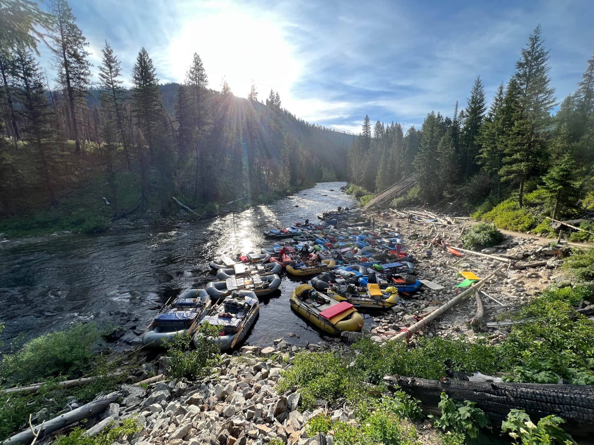 Rafts sit in the river before a long day