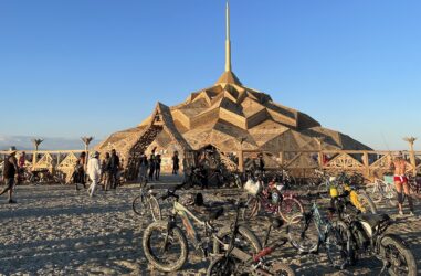 bikes sit outside the Temple of the Heart at Burning Man