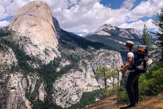 Emily looking out at Half Dome in Yosemite